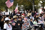 Boston, Asian American, scores of asian americans rally over harvard s bias admission patterns, American flags