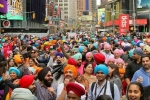 sikhs in new york, sikhs in new york, thousands celebrate sikh culture at times square on turban day, Guinness world record