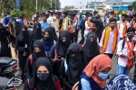 Hijab Controversy news, Hijab Controversy in Karnataka, karnataka hijab controversy schools shut for three days, Jeans