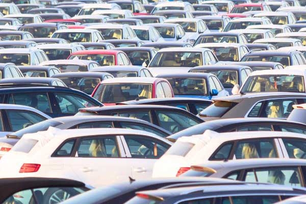 How has climate change led to a dip in automobile sales?